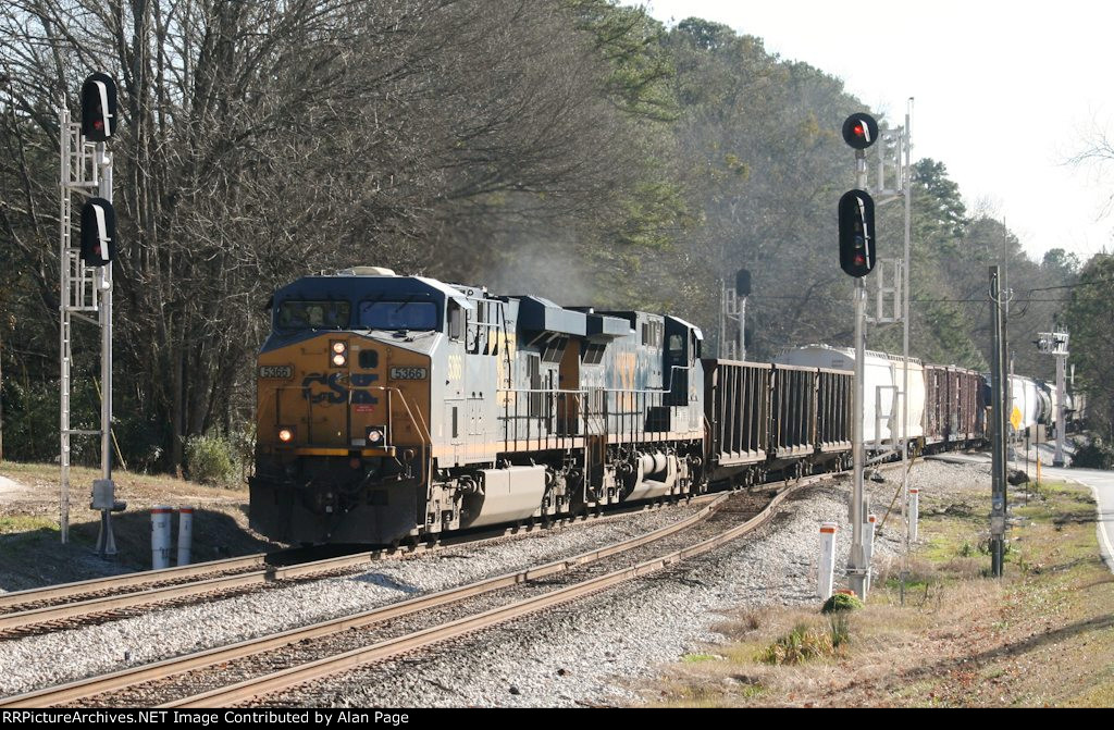 CSX 5366 and 3 power past the Union City signals